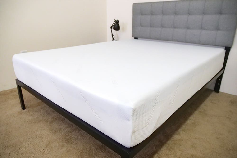 weight of king size tuft and needle mattress