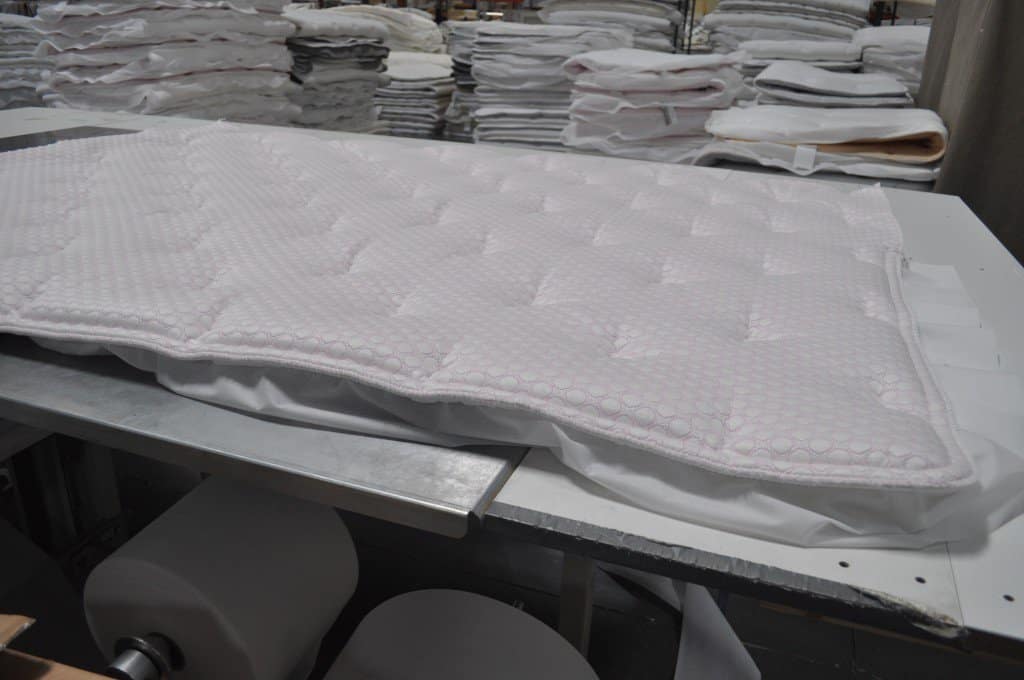 completed quilted mattress cover awaiting assembly