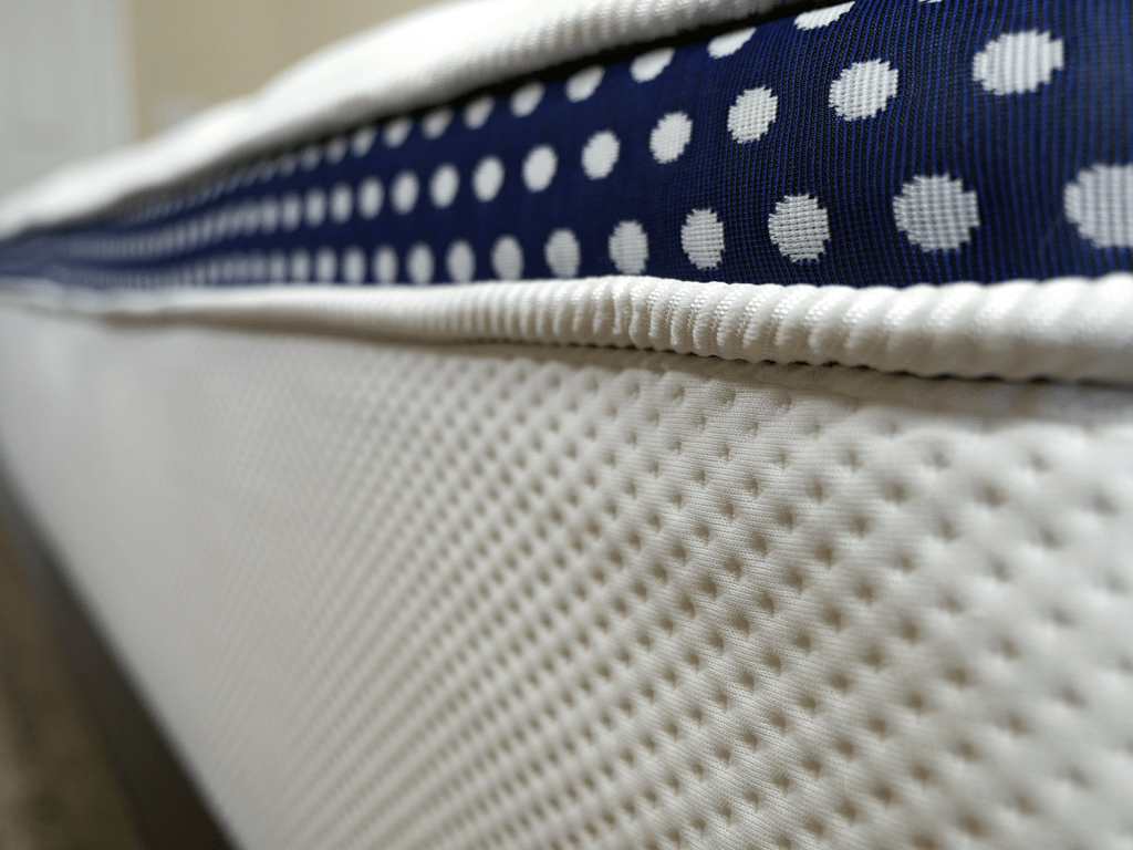 Ultra close up shot of Winkbed's cover and side panel