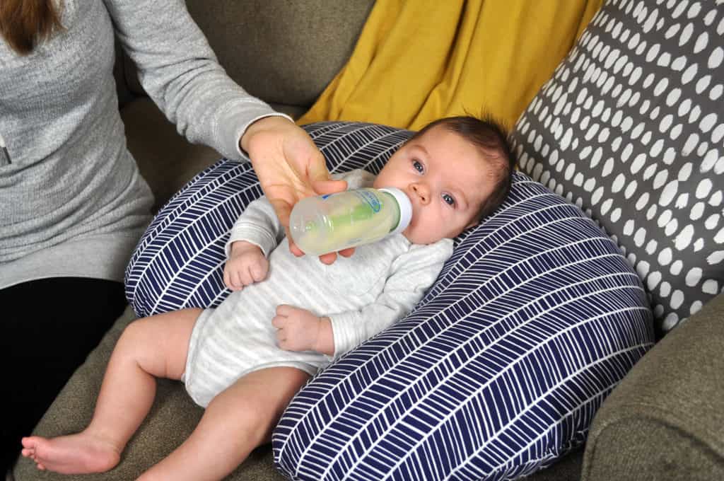 Graham modeling the support of the Boppy pillow