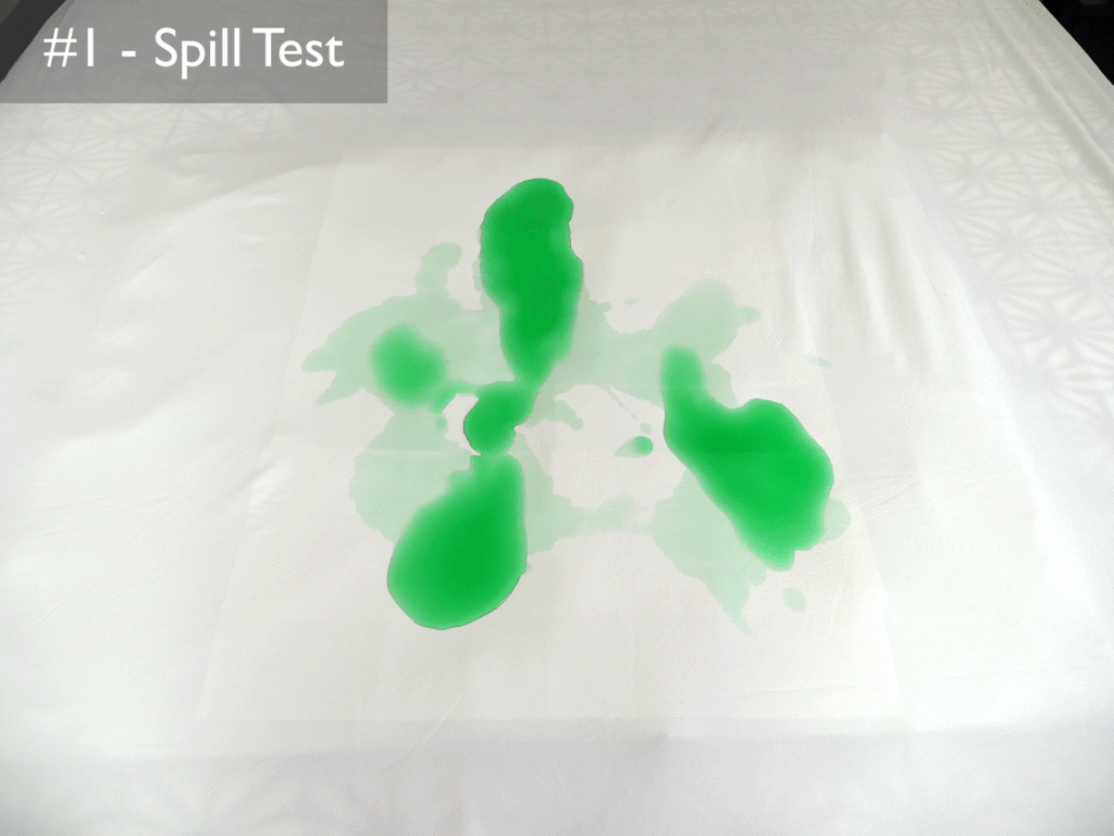 Purple mattress protector spill test one