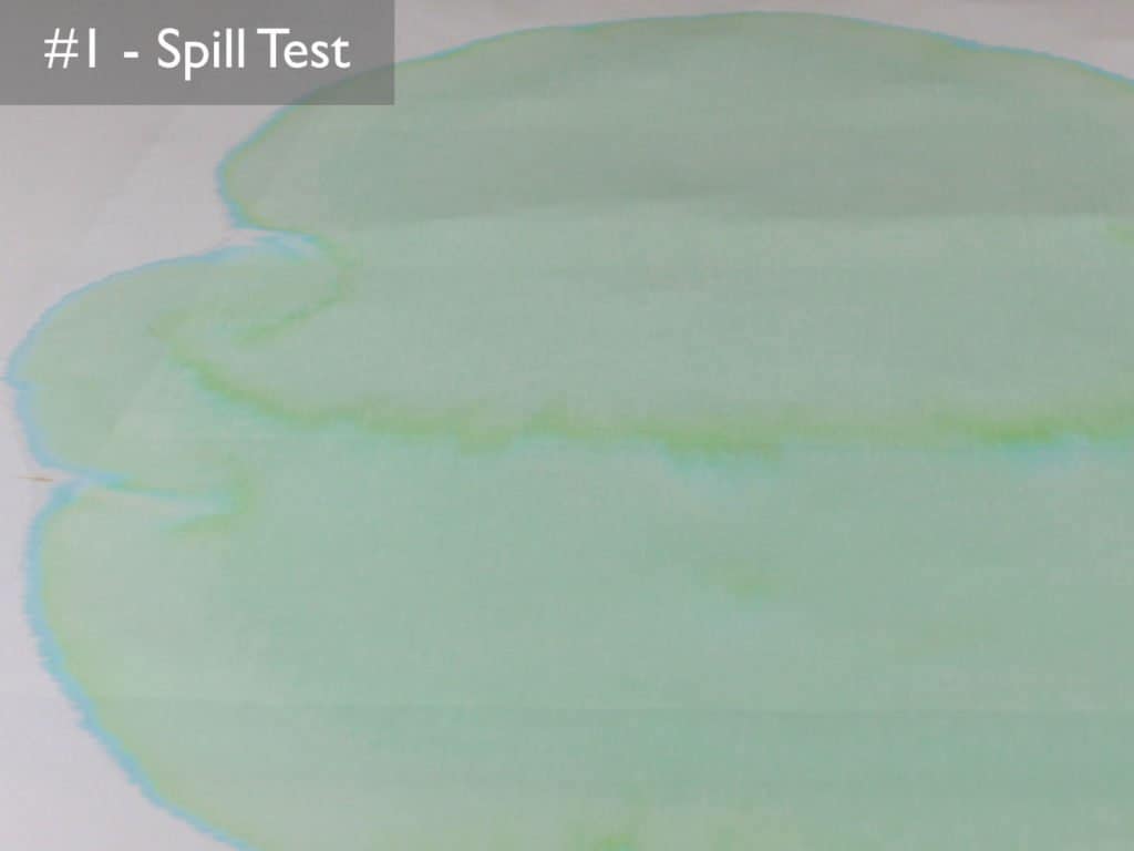 Spill test #1 - dyed water is poured onto the Sleep Tite Encasement protector and sits for 6 hours