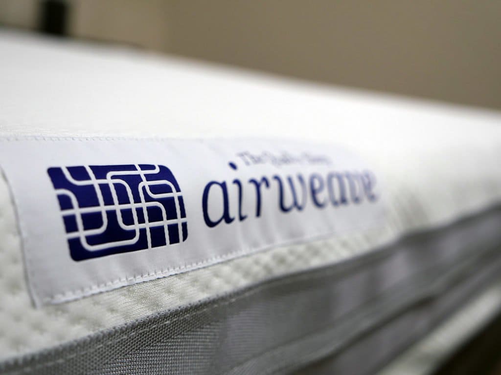 Ultra close up shot of the Airweave mattress logo