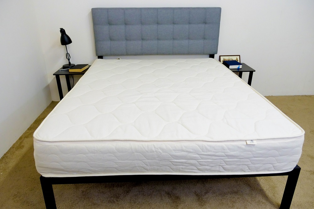 Spindle mattress on bed frame