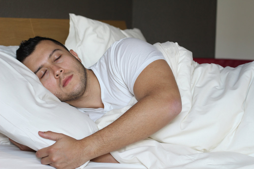 man sleeping through sleep stages