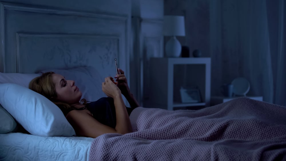 Using Phone In Bed 