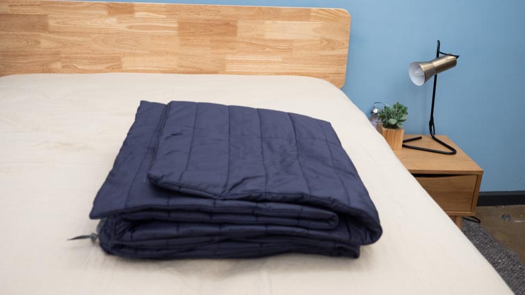 The Sleep Number True Temp weighted blanket.