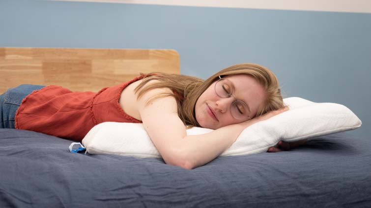 https://sleepopolis.com/wp-content/uploads/2021/07/belly-sleeper-pillow.jpg