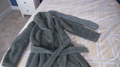 Weighted discount robe gravity