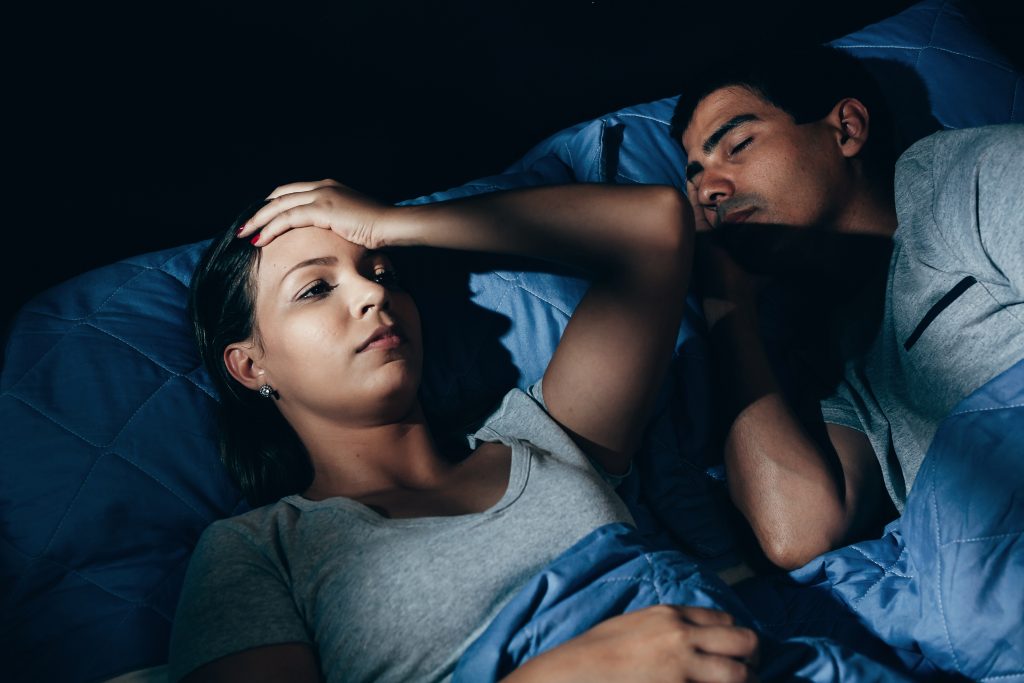 Couple Sleeping Unhappy