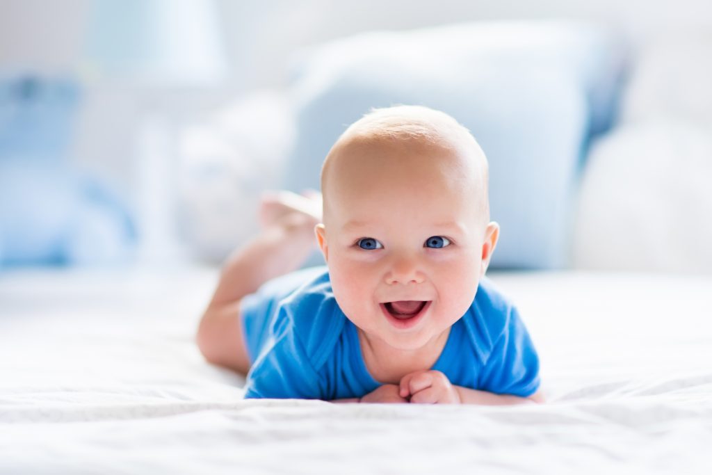 baby on flat surface