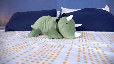 Dinosaur Weighted Plush Kids' Throw Pillow Pink - Pillowfort™