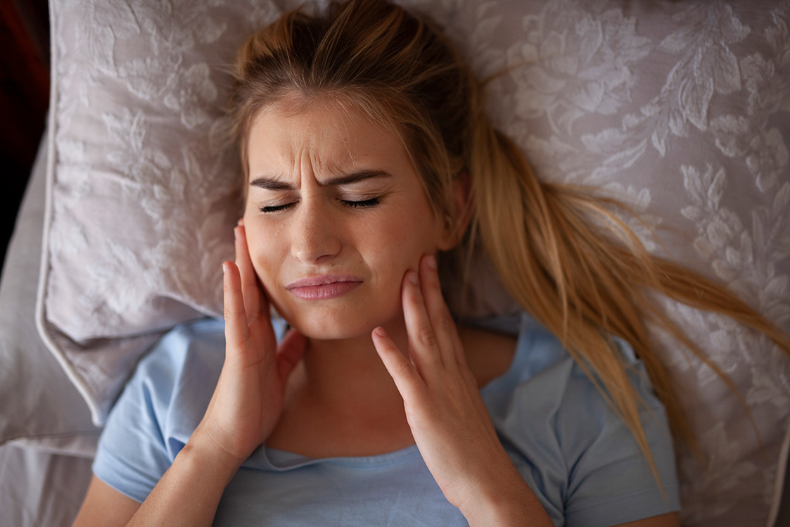 Causes and Solutions Behind Jaw Clenching and Teeth Grinding in Sleep