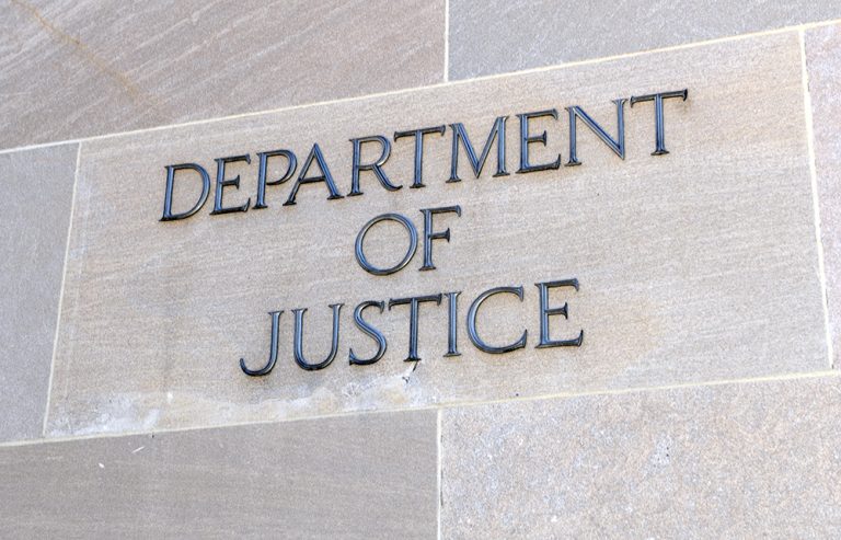 Close-up shot of department of justice logo