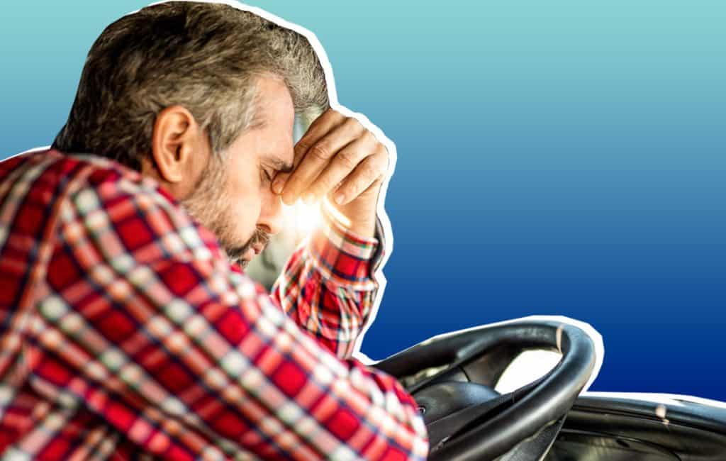 Close-up graphic of man sleeping in his car