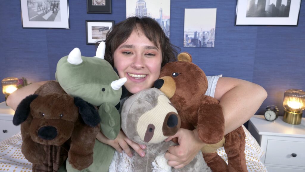 amelia with weighted stuffed animals