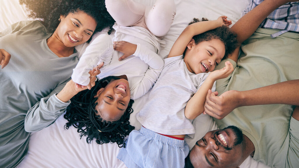 Happy Family in Bed