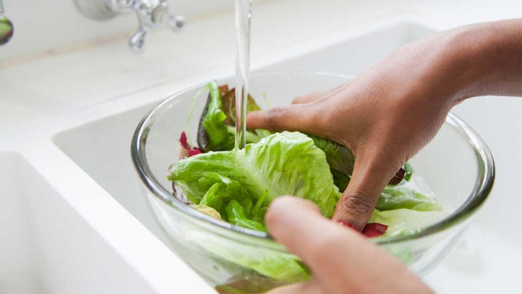 WomanWashingLettuce