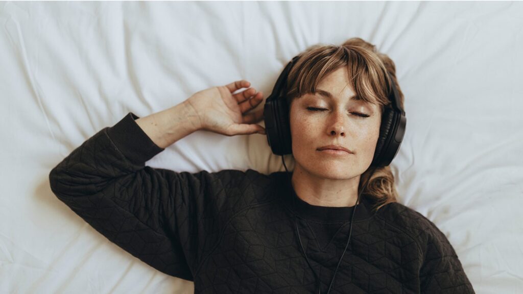 Woman listening to ASMR