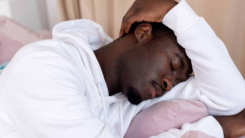 man falling asleep, experiencing excessive sleepiness