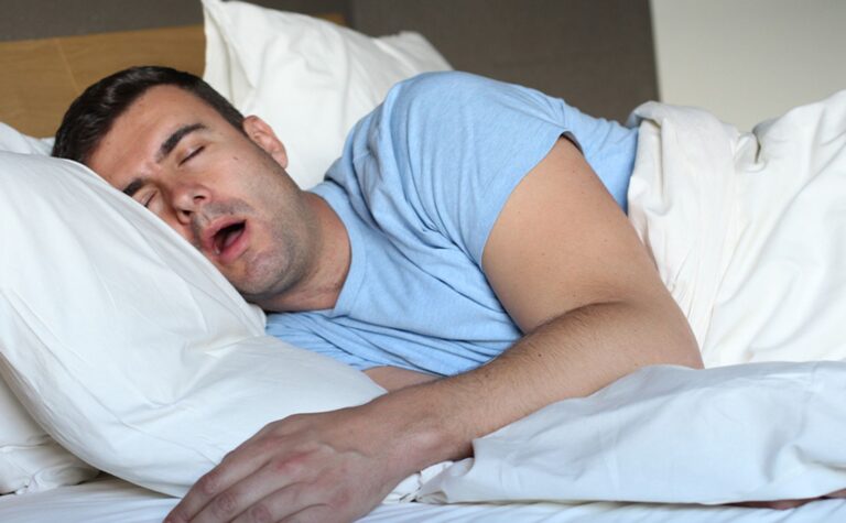 man snoring with sleep apnea
