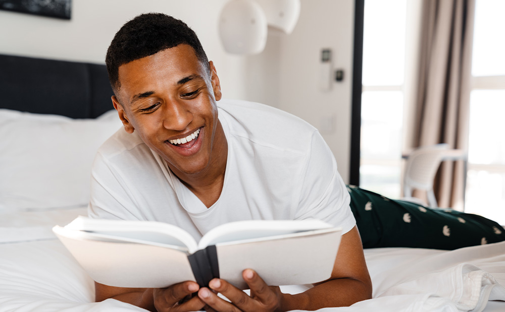 person reading in bed