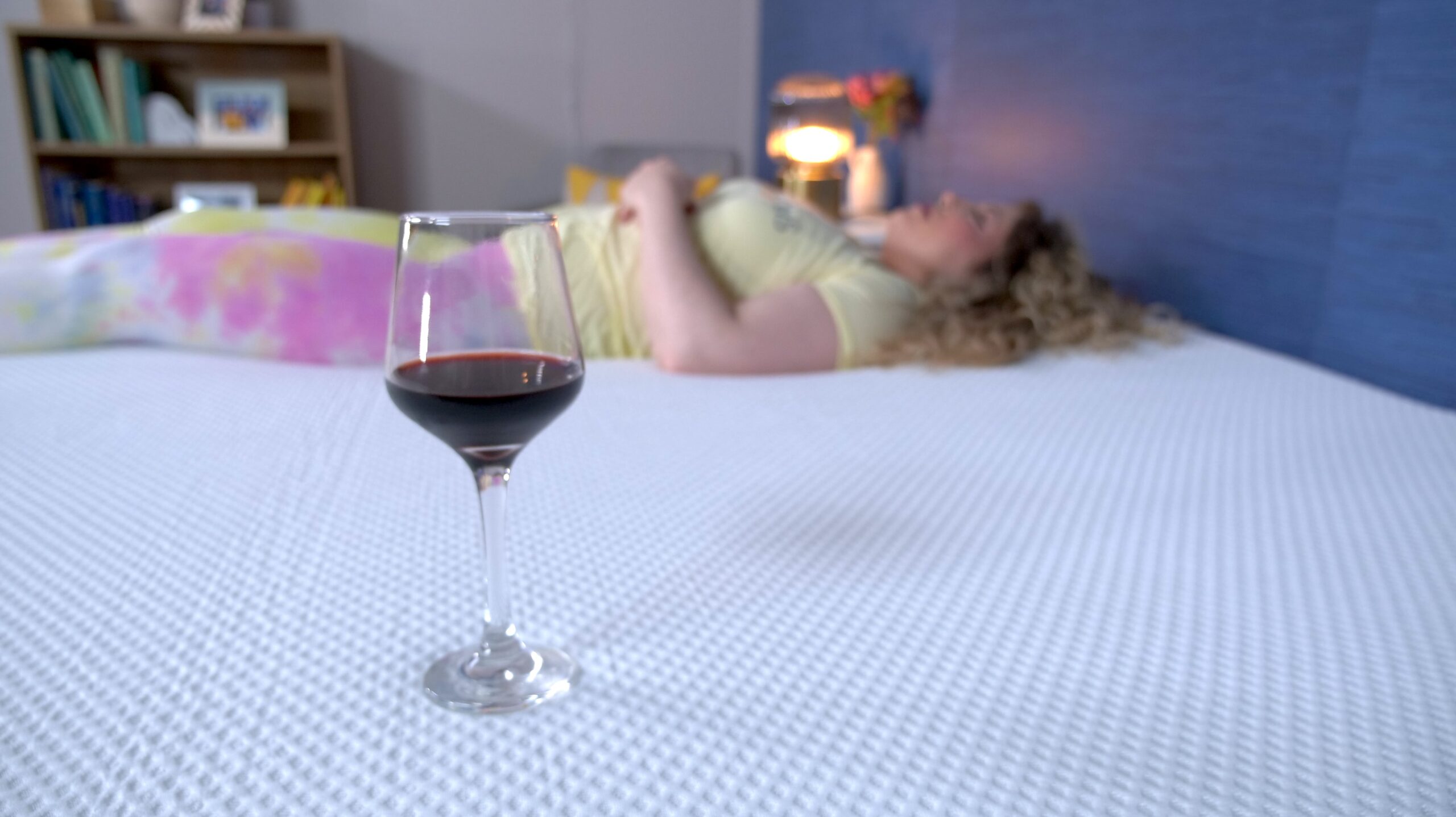 Nichole doing the wine test on the Nectar Premier Mattress