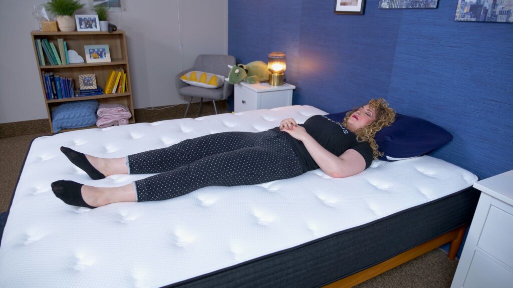 Nichole back sleeping on the Plank Firm Mattress