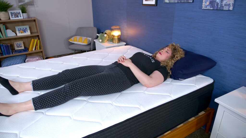 Nichole back sleeping on the Plank Firm Luxe mattress