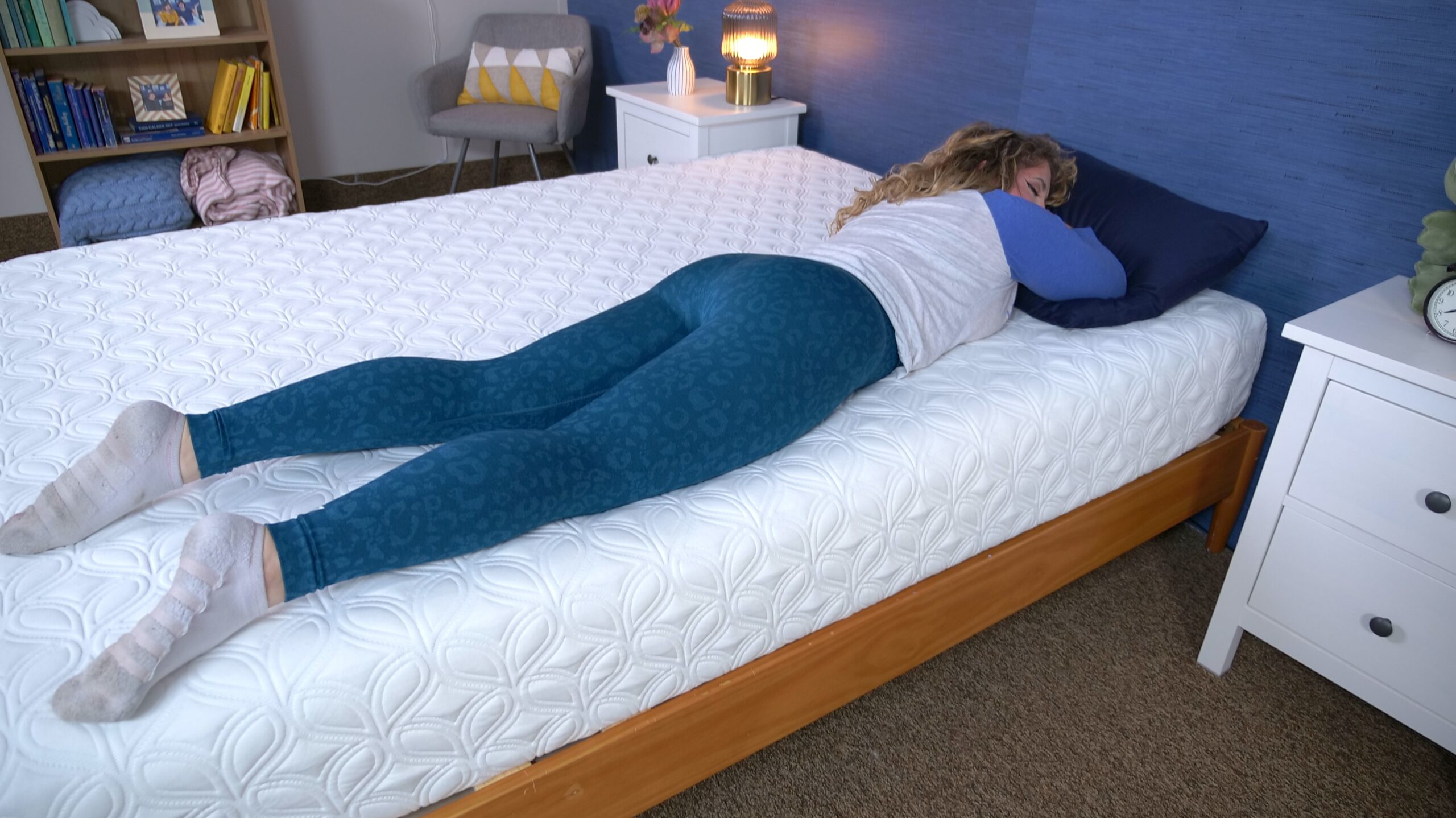 Nichole stomach sleeping on the Cocoon Chill Mattress Construction