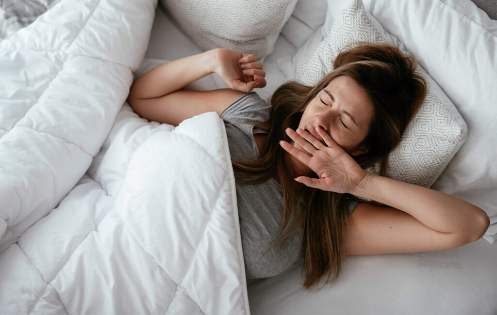 woman sleeping in t-shirt