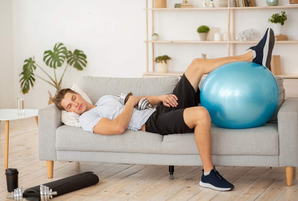 man sleeping after workout