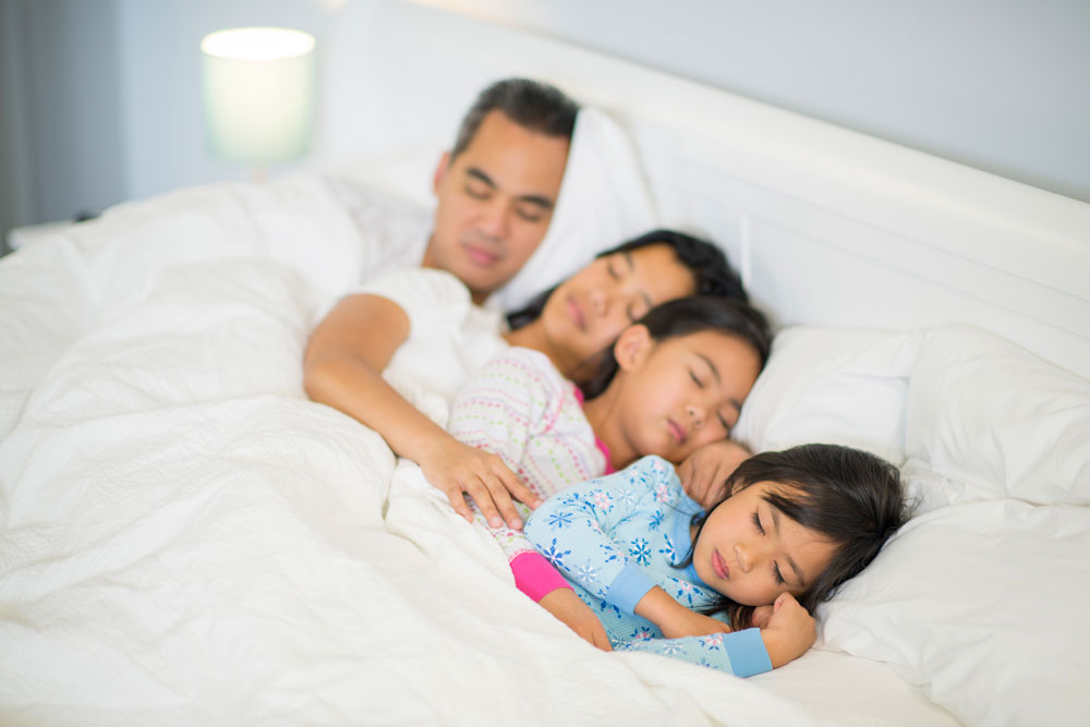 co-sleeping family