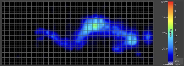 A pressure map graphic of a lightweight tester lying on the Bear Elite Hybrid in the side-sleeping position. The map is mostly blue, indicating little to no pressure buildup. However, there is a slight flareup of green at the hip, meaning there's a little bit of pressure there.