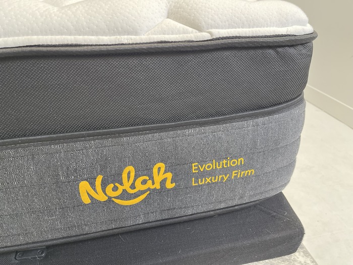 A closeup of the mattress tag on the Nolah Evolution.