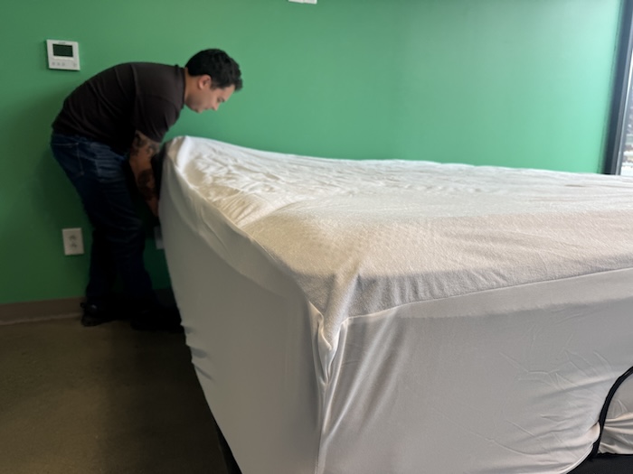 Installng a Helix Waterproof Mattress Protector.