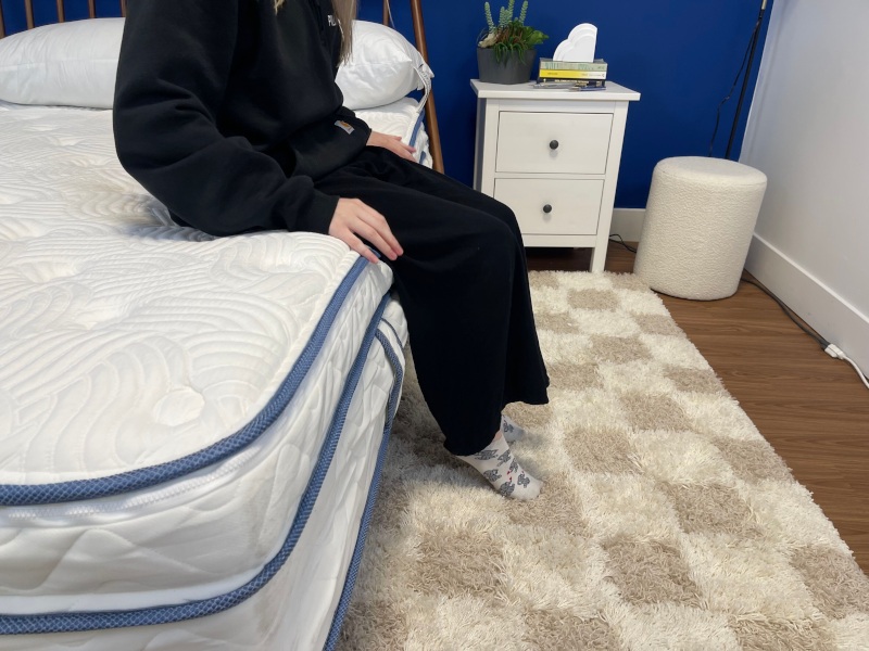 Riley sits along the edge of a DLX Premier Hybrid.