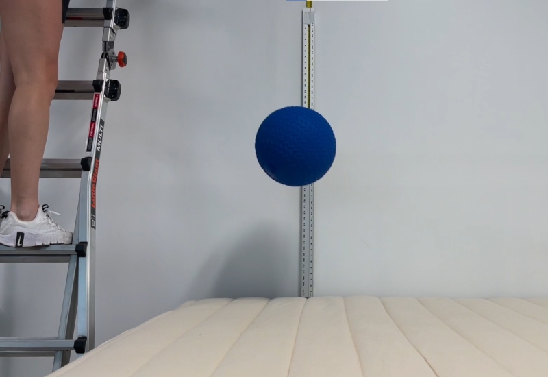 Our testers do a bounce test on a Birch Luxe Natural Mattress