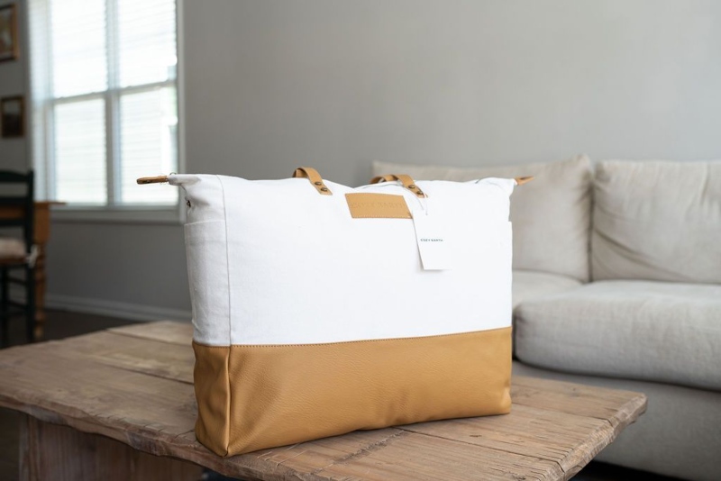 A Cozy Earth Silk Comforter in the packaging
