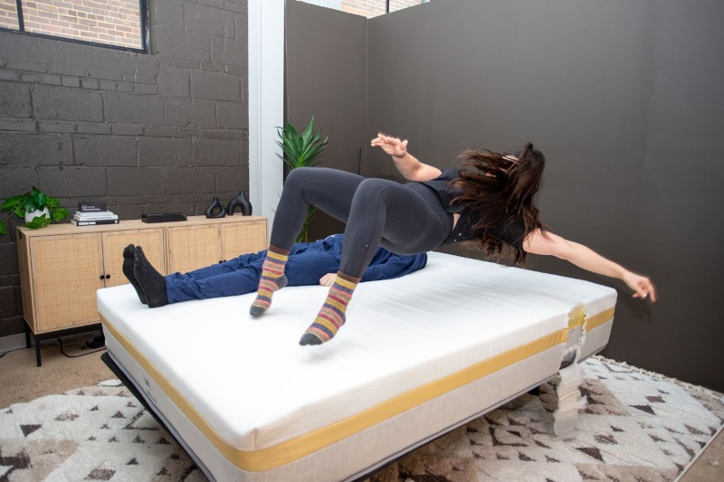 Our testers perform a partner test on a Helix Dawn Mattress