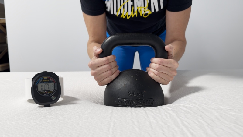 Our tester performs a response test on a Polysleep Luna mattress