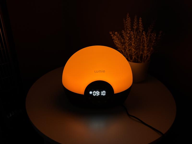The Lumie Bodyclock Glow 150 glowing orange