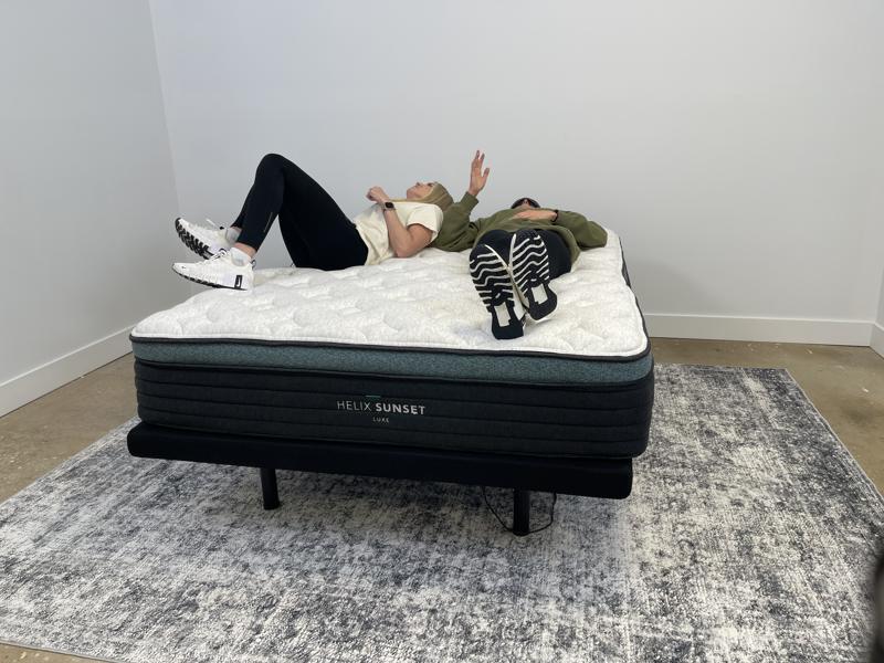 Our product testers partner up for motion isolation testing of the Helix Sunset Luxe Mattress.