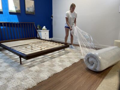 Our tester unboxing the Helix Sunset Luxe Mattress