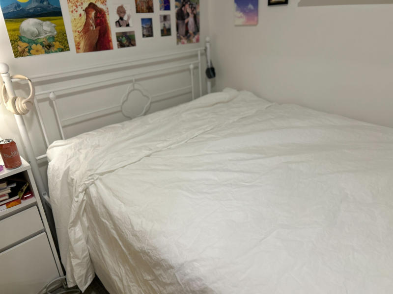 Coop Sleep Goods Cotton Percale Sheets on a bed in the home of our tester