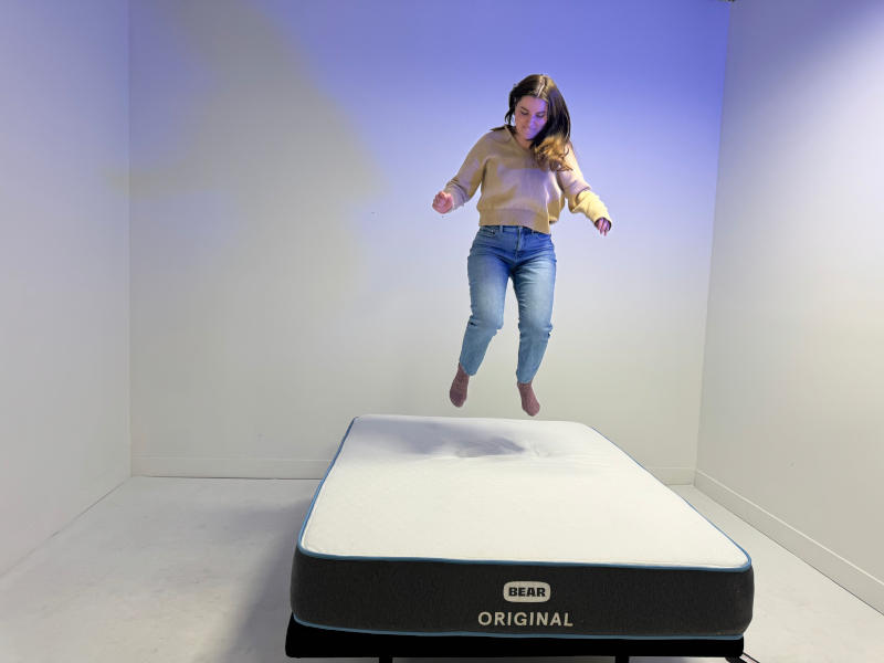 Our product tester evaluating the durability of the Bear Original Mattress